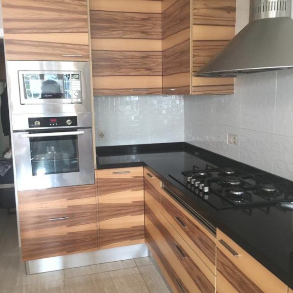 Detalle cocina moderna en raiz muebles a medida
