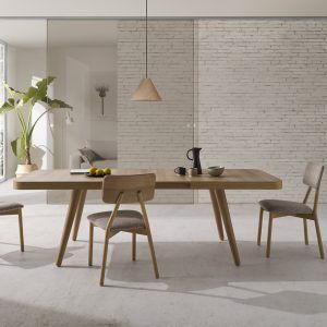 ambiente detalle apertura mesa comedor redonda boheme extensible moderna patas conicas salon moderna